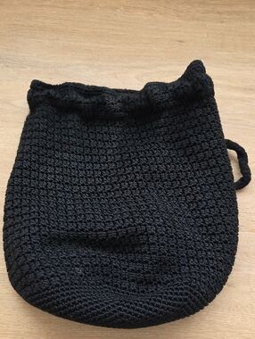 The Sak Black Crochet Drawstring Backpack